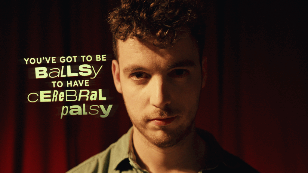 Jeune homme avec le texte "You've got to be ballsy to have cerebral palsy"